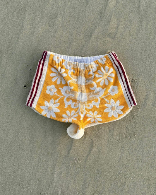 Orana redefining upcycling — one-of-a-kind reworked shorts, handmade in Byron Bay, Australia, from reclaimed vintage towels and textiles, inspired by nostalgic summer holiday memories, for a conscious and sustainable future
