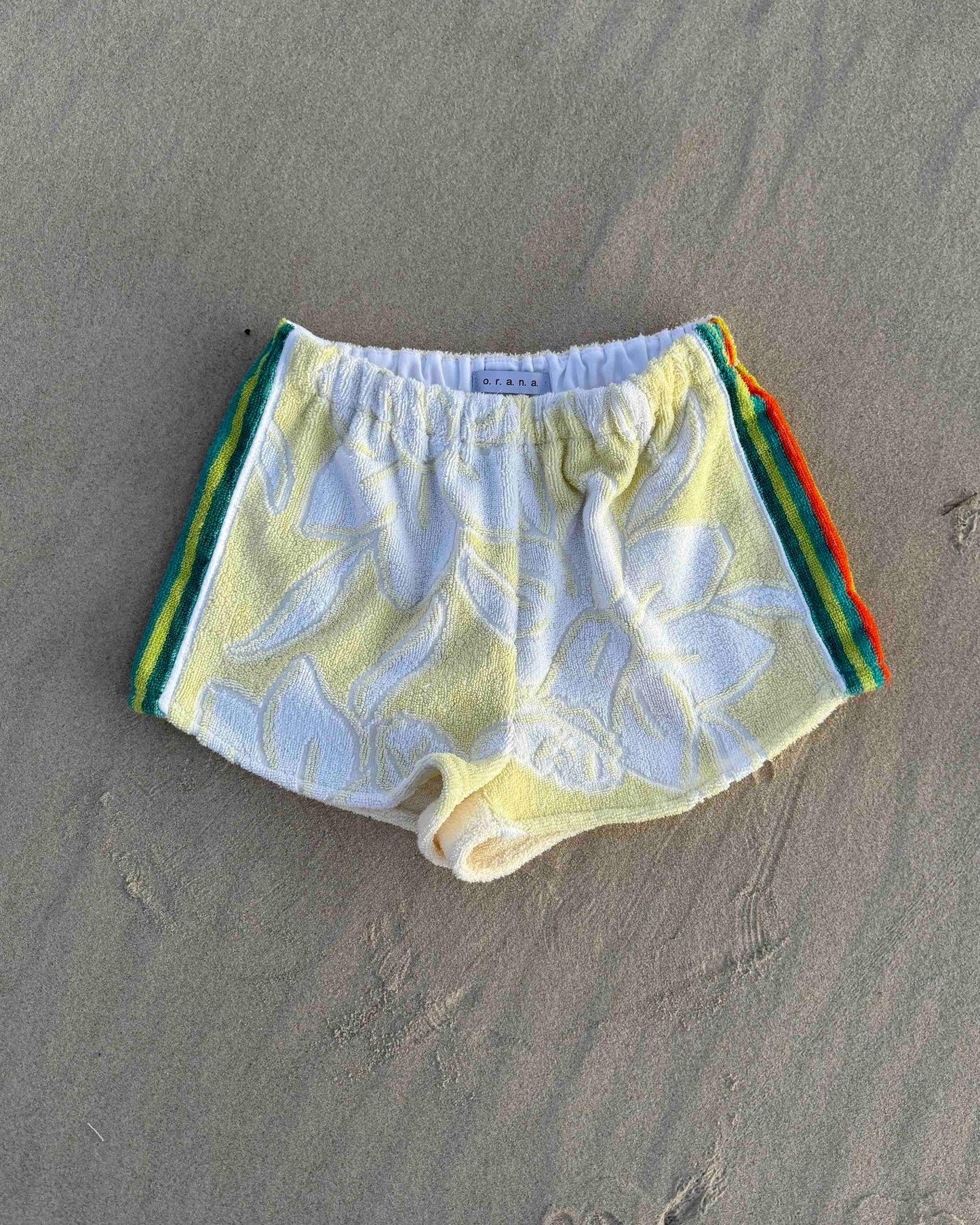 Orana redefining upcycling — one-of-a-kind reworked shorts, handmade in Byron Bay, Australia, from reclaimed vintage towels and textiles, inspired by nostalgic summer holiday memories, for a conscious and sustainable future
