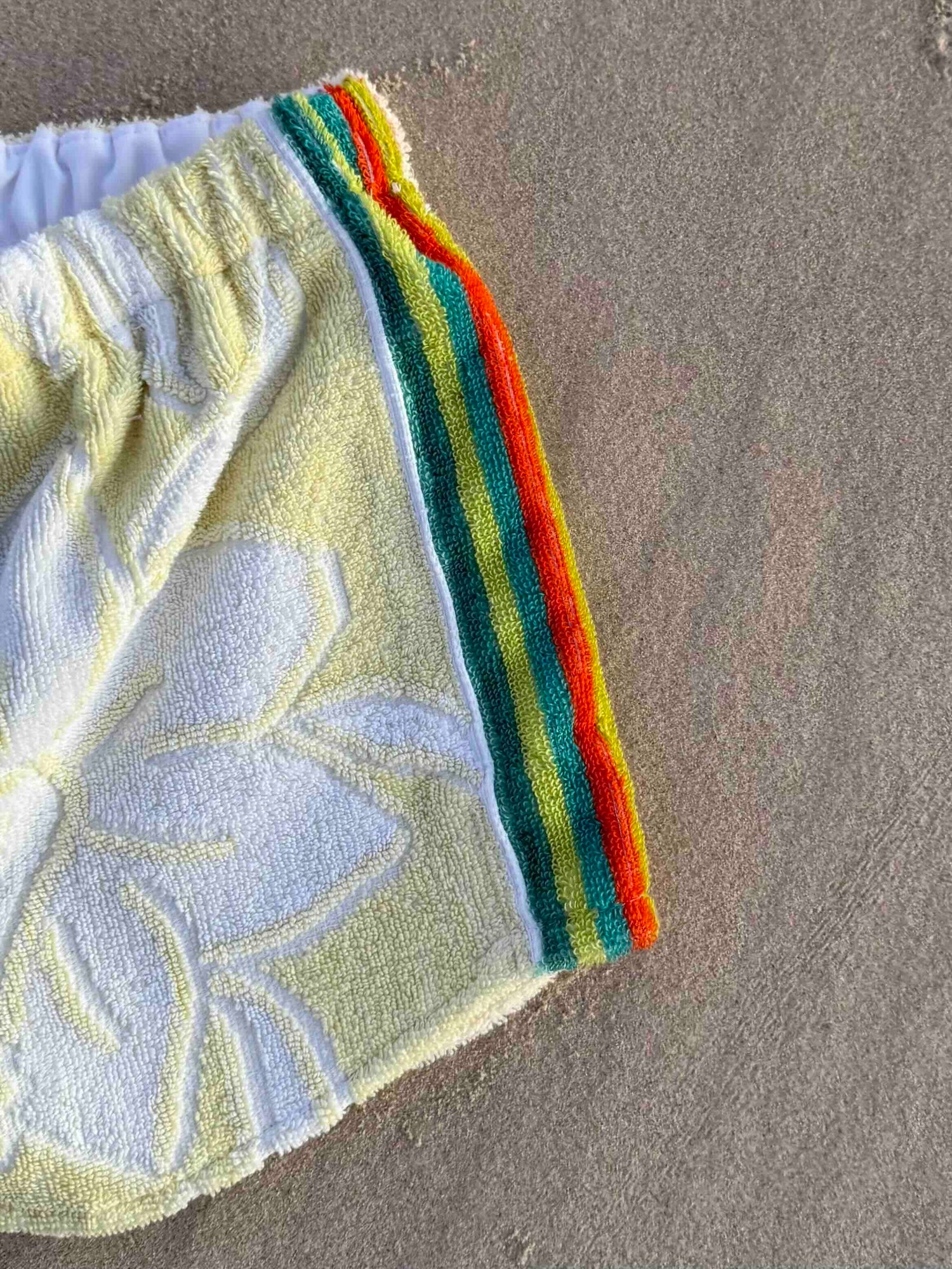 Orana redefining upcycling — one-of-a-kind reworked shorts, handmade in Byron Bay, Australia, from reclaimed vintage towels and textiles, inspired by nostalgic summer holiday memories, for a conscious and sustainable future
