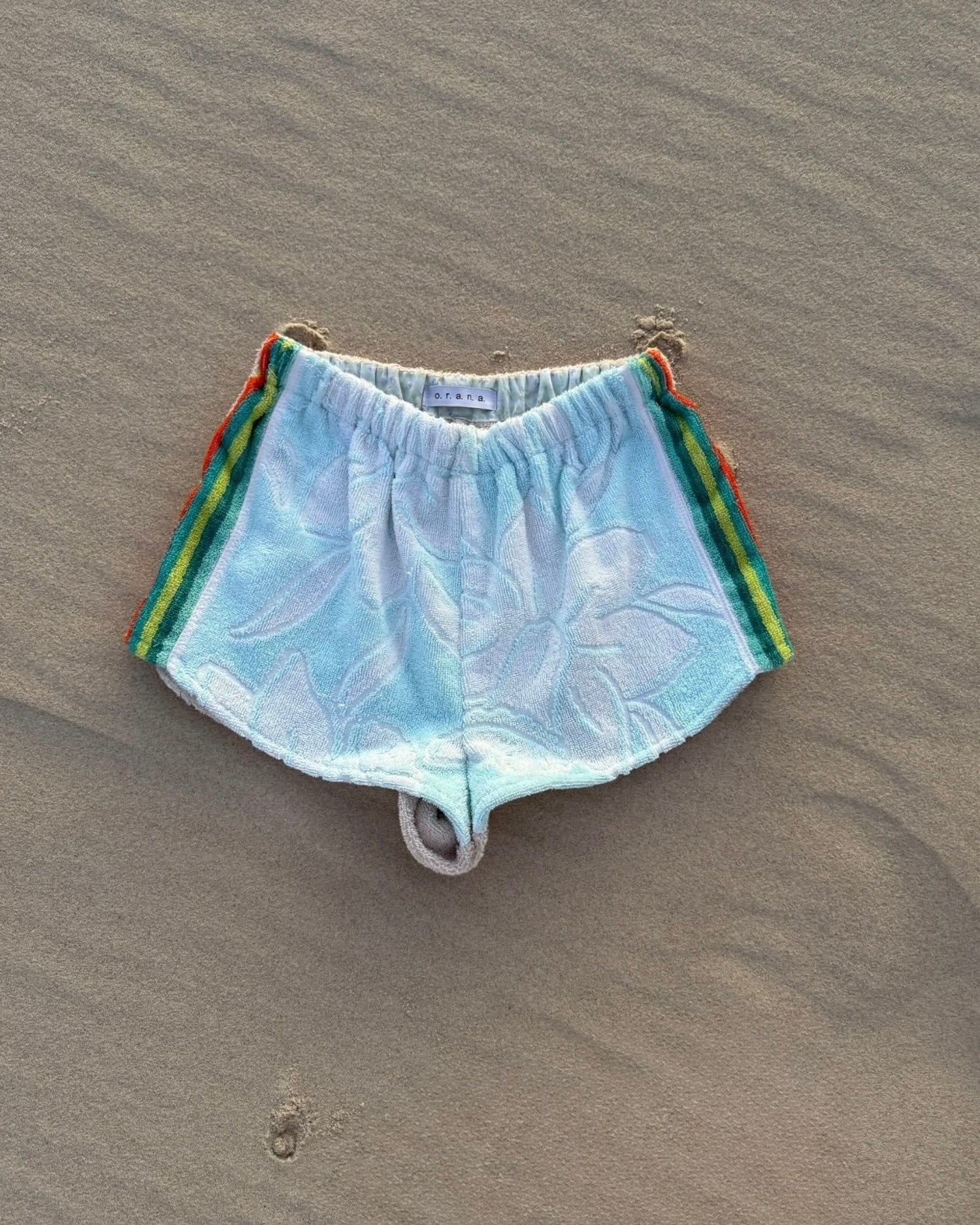 Orana redefining up cycling — one-of-a-kind reworked shorts, handmade in Byron Bay, Australia, from reclaimed vintage towels and textiles, inspired by nostalgic summer holiday memories, for a conscious and sustainable future.
