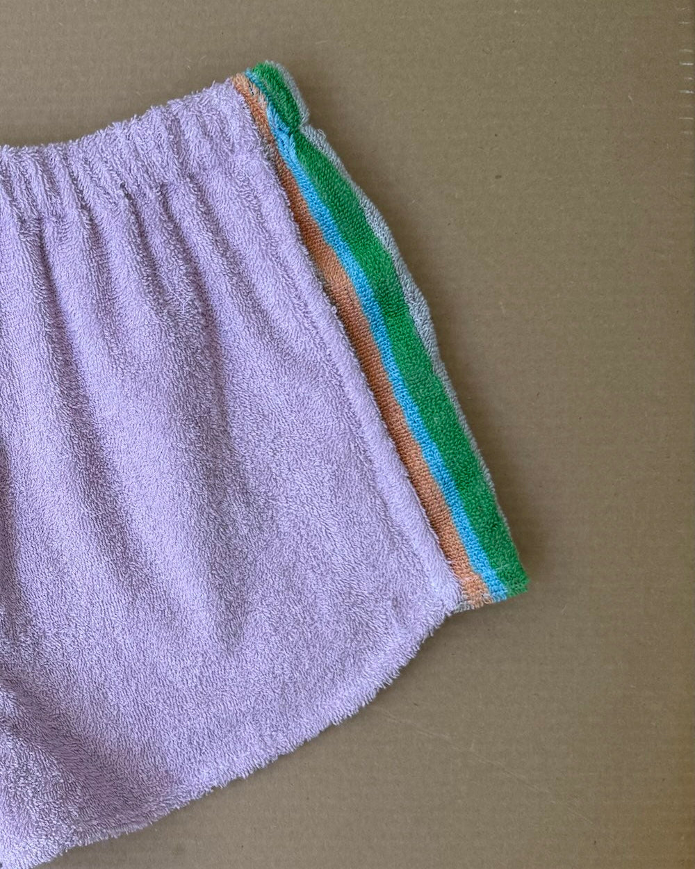 Orana redefining upcycling — one-of-a-kind reworked shorts, handmade in Byron Bay, Australia, from reclaimed vintage towels and textiles, inspired by nostalgic summer holiday memories, for a conscious and sustainable future
