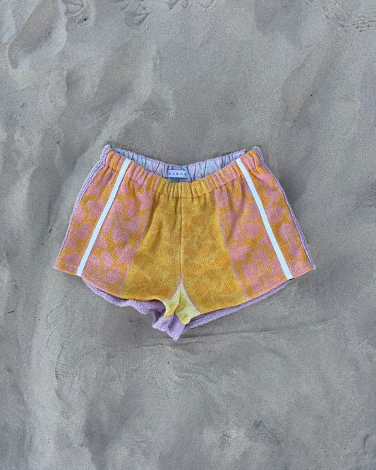Orana redefining upcycling — one-of-a-kind reworked shorts, handmade in Byron Bay, Australia, from reclaimed vintage towels and textiles, inspired by nostalgic summer holiday memories, for a conscious and sustainable future
