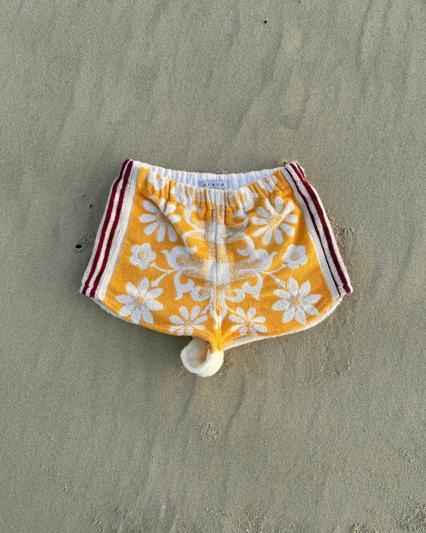 Orana redefining upcycling — one-of-a-kind reworked shorts, handmade in Byron Bay, Australia, from reclaimed vintage towels and textiles, inspired by nostalgic summer holiday memories, for a conscious and sustainable future
