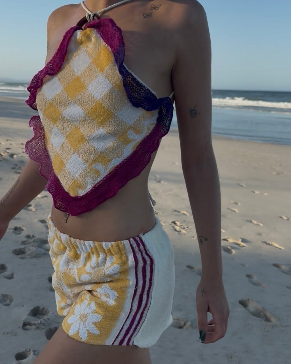 Orana redefining upcycling — one-of-a-kind reworked shorts, handmade in Byron Bay, Australia, from reclaimed vintage towels and textiles, inspired by nostalgic summer holiday memories, for a conscious and sustainable future
