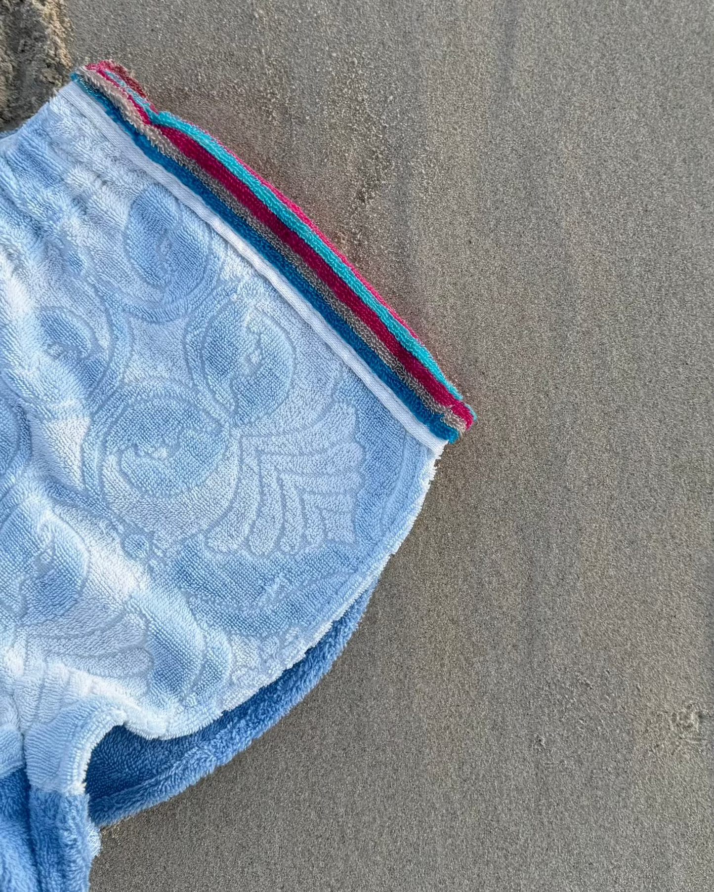 Orana redefining upcycling — one-of-a-kind reworked shorts, handmade in Byron Bay, Australia, from reclaimed vintage towels and textiles, inspired by nostalgic summer holiday memories, for a conscious and sustainable future
