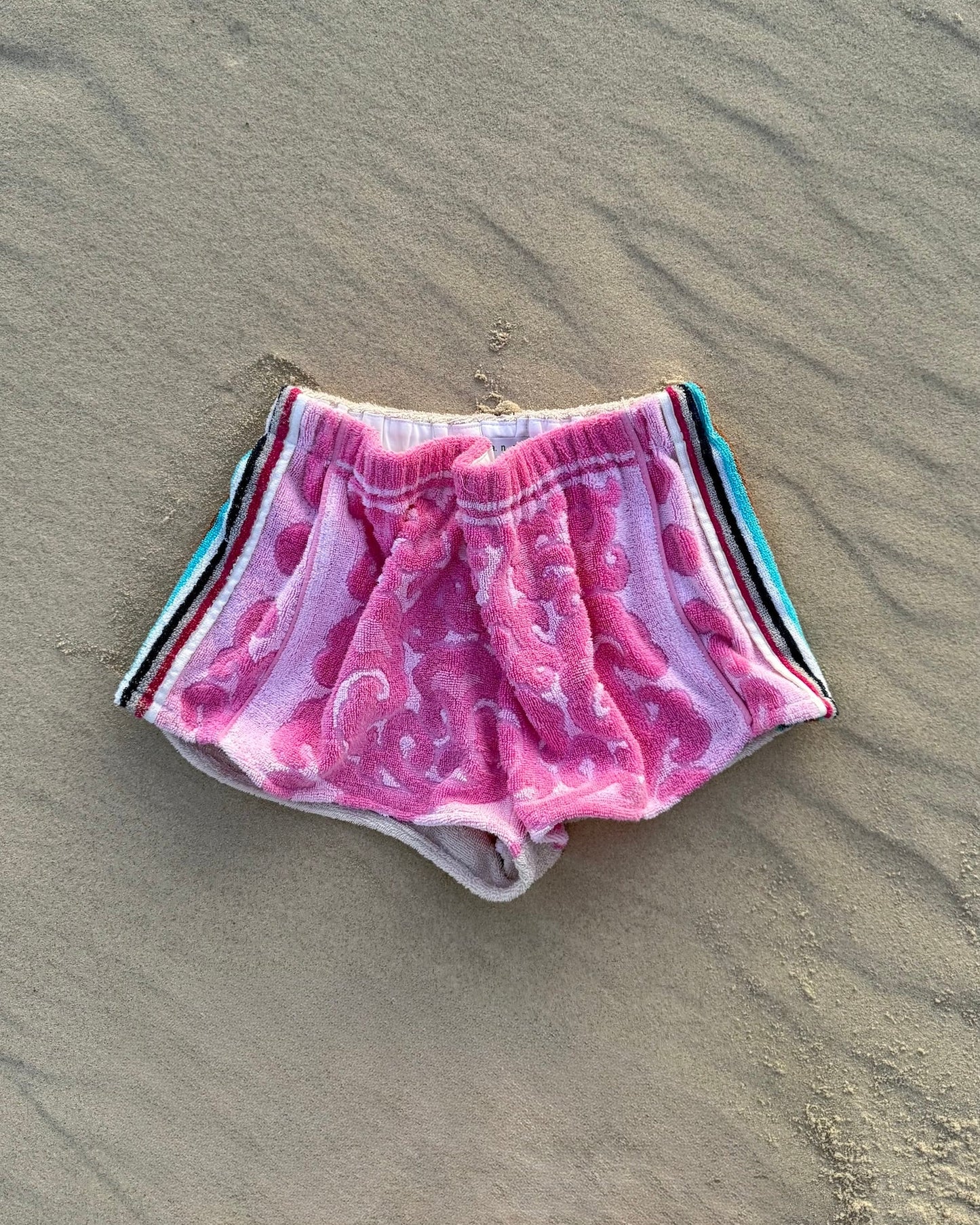 Orana redefining upcycling — one-of-a-kind reworked shorts, handmade in Byron Bay, Australia, from reclaimed vintage towels and textiles, inspired by nostalgic summer holiday memories, for a conscious and sustainable future
