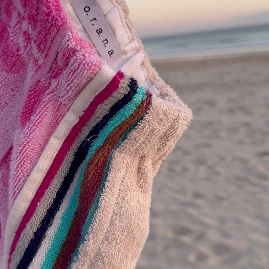 Orana redefining upcycling — one-of-a-kind reworked shorts, handmade in Byron Bay, Australia, from reclaimed vintage towels and textiles, inspired by nostalgic summer holiday memories, for a conscious and sustainable future
